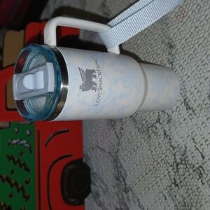 LoveShackFancy Cream and Blue Stanley Ornament. PRICE FIRM